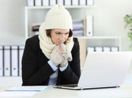 Cold executive working with a heater failure in winter