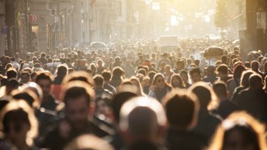 Blurred crowd of unrecognizable at the street